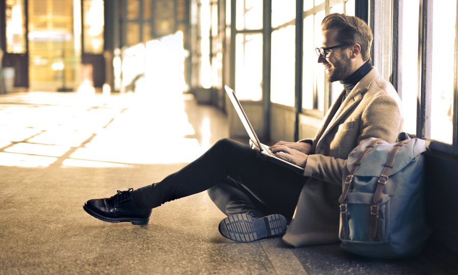 A relaxed traveller waiting at the airport